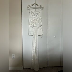 White mini dress with large bow train